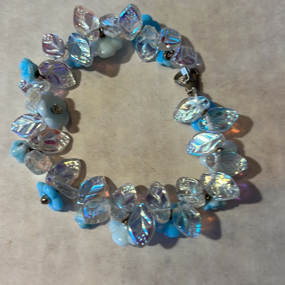 NWOT. Blue Flowers Clear Leaves Acrylic Crystals Bracelets